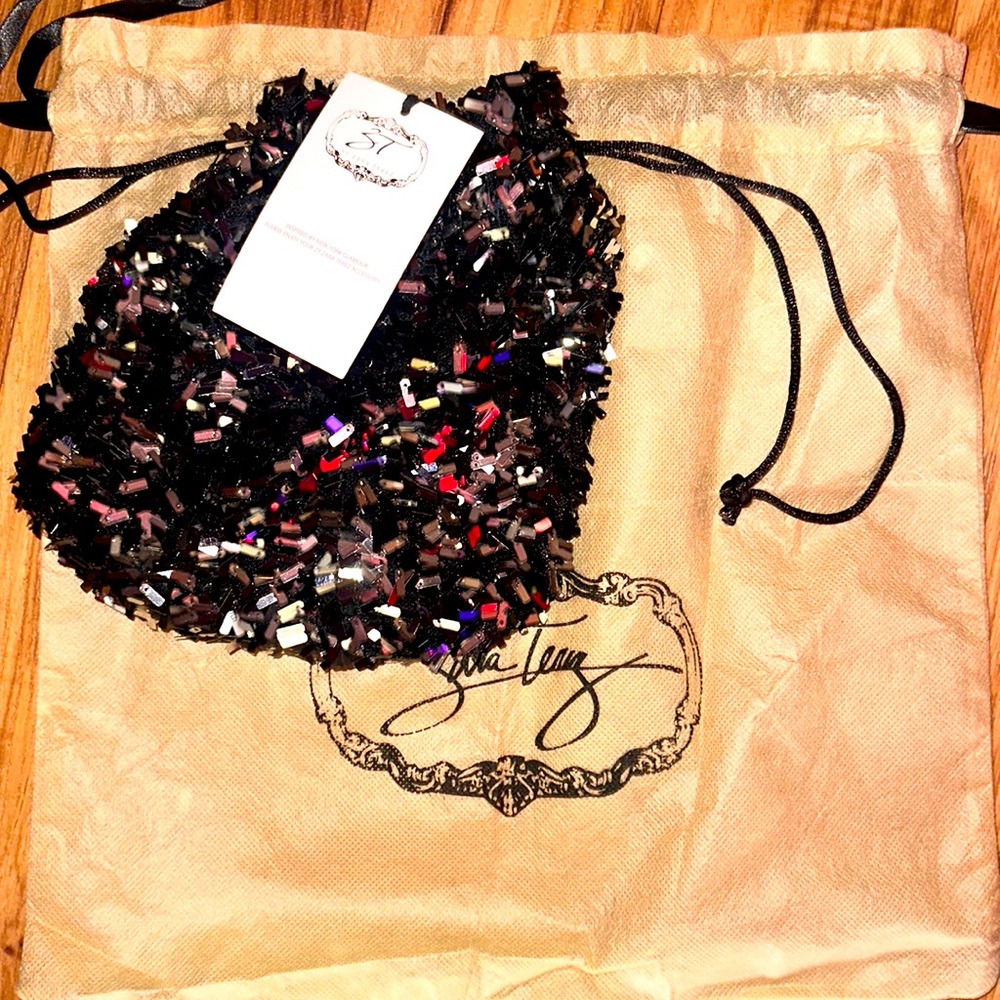 NWT Zara Terez silver sequins bag.